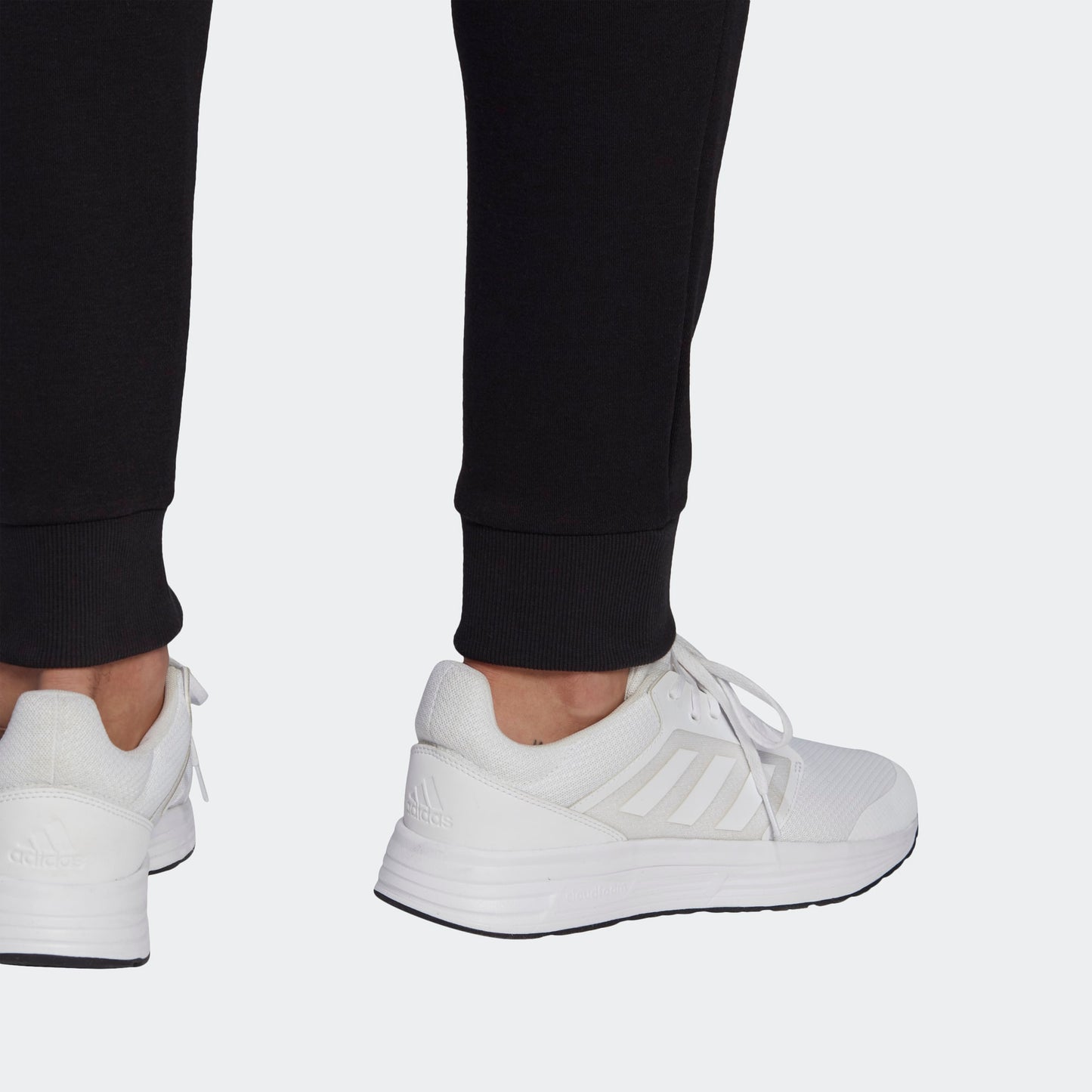 Adidas pantalonefelpa con polsino logo piccolo m sl fl tc pt black con logo piccolo68